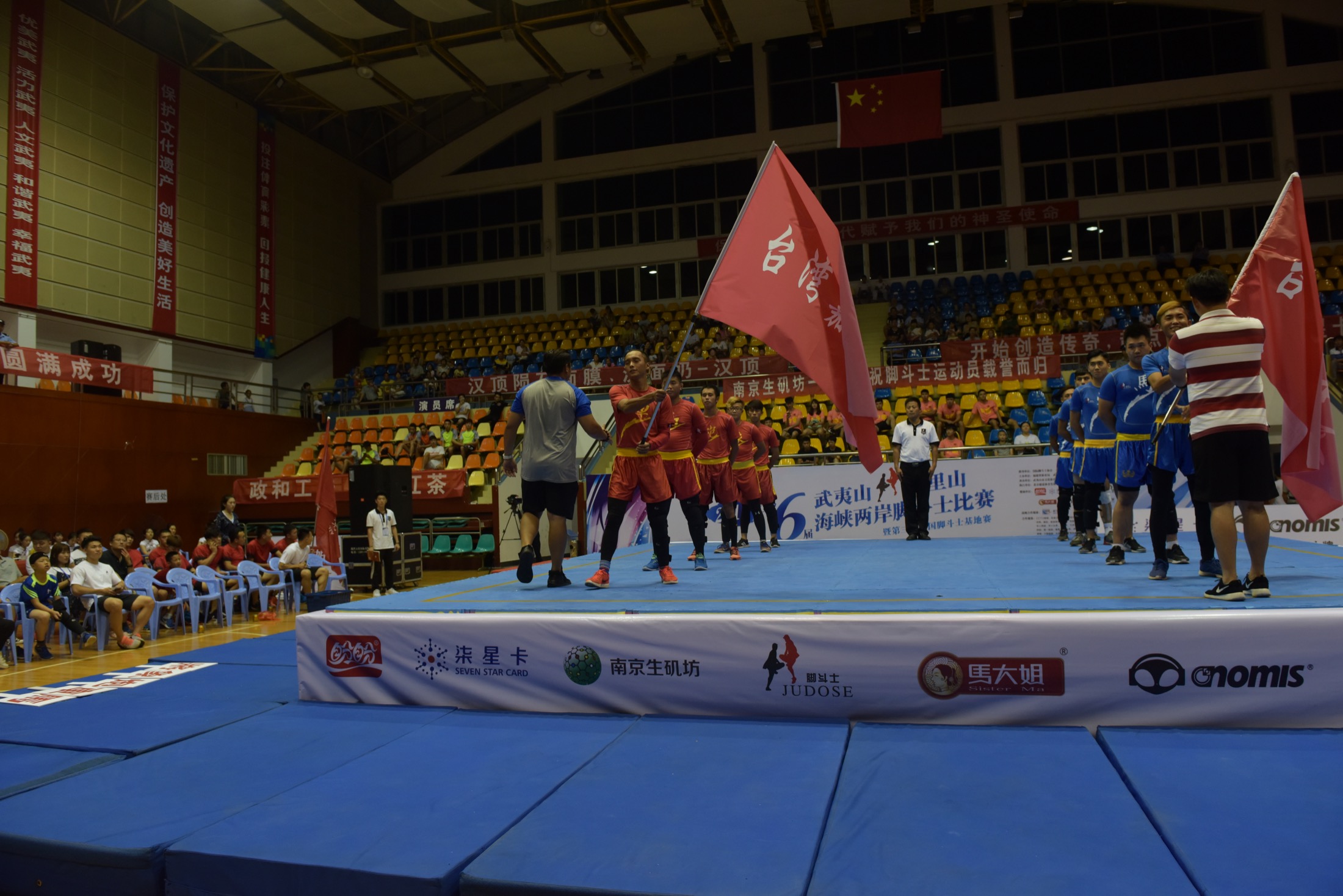 Jowdou teams entering an event arena